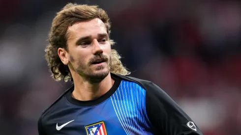 Antoine Griezmann doing warm up activities with Atletico Madrid.