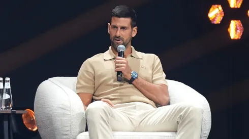 Novak Djokovic speaks on stage.