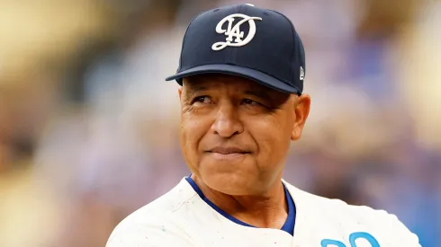 Dave Roberts looks on prior to a game against the Pirates at Dodger Stadium on April 26, 2025.