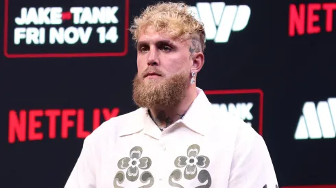 Jake Paul looks on during a press conference.