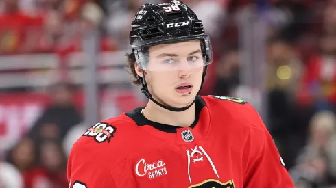 Connor Bedard #98 of the Blackhawks looks on against the Senators.
