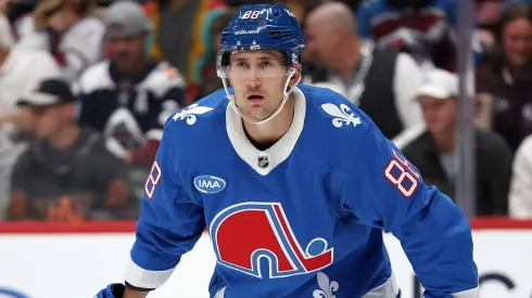 Martin Necas #88 of the Avalanche plays against the Hurricanes.