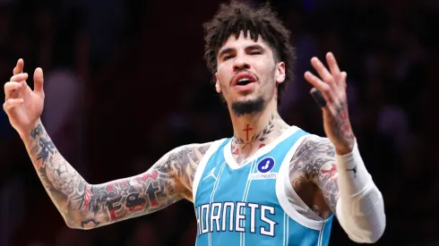 Charlotte Hornets' LaMelo Ball reacts during an NBA game against the Miami Heat.