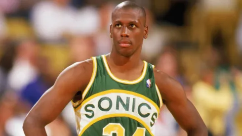 Xavier McDaniel #34 of the Seattle Supersonics looks on during a game in the 1989-1990 NBA season.