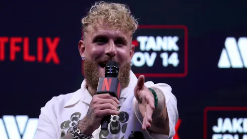 Jake Paul speaks at a news conference.