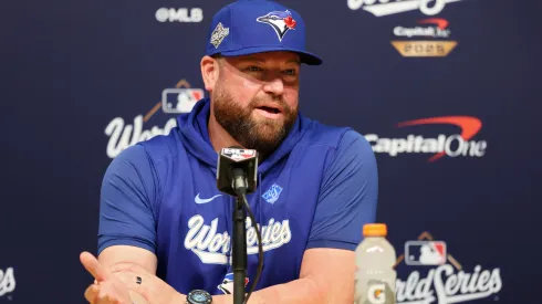 Manager John Schneider #14 of the Toronto Blue Jays speaks to the media.