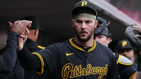 Paul Skenes #30 of the Pittsburgh Pirates celebrates with teammates prior to a baseball game.