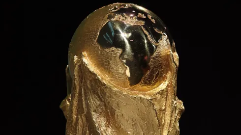 The FIFA World Cup trophy is displayed during a FIFA Legends Panel Discussion in 2025.