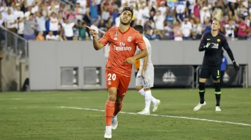 EL GOLEADOR. Marco Asensio celebra el 1-0 ante Roma con Real Madrid.
