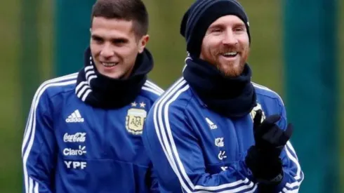 Bustos junto a Messi en la Selección Argentina.
