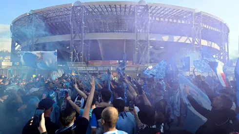 NAPLES, ITALY – MAY 04: Fans of SSC Napoli are seen celebrating outside the Stadio Diego Armando Maradona on May 04, 2023 in Naples, Italy. (Photo by Francesco Pecoraro/Getty Images)
