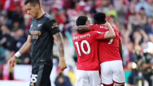 NOTTINGHAM, ENGLAND – MAY 20: Taiwo Awoniyi celebrates with Morgan Gibbs-White of Nottingham Forest after scoring the team's first goal during the Premier League match between Nottingham Forest and Arsenal FC at City Ground on May 20, 2023 in Nottingham, England. (Photo by Catherine Ivill/Getty Images)
