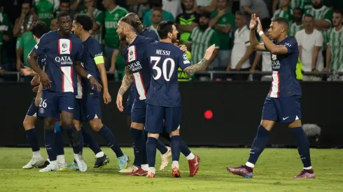 HAIFA, ISRAEL - SEPTEMBER 14: Kylian Mbappé of Paris Saint-Germain celebrates with Lionel Messi after socirng his team's third goal during the UEFA Champions League group H match between Maccabi Haifa FC and Paris Saint-Germain at Sammy Ofer Stadium on September 14, 2022 in Haifa, Israel. (Photo by Amir Levy/Getty Images)