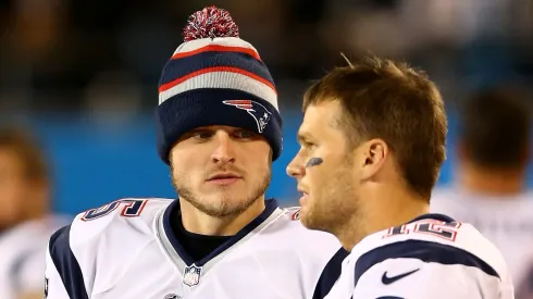 Ryan Mallett y Tom Brady.
