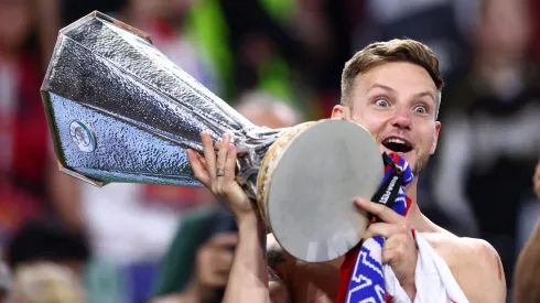 BUDAPEST, HUNGARY – MAY 31: Ivan Rakitic of Sevilla FC holds the winners trophy after the UEFA Europa League 2022/23 final match between Sevilla FC and AS Roma at Puskas Arena on May 31, 2023 in Budapest, Hungary. (Photo by Clive Rose/Getty Images)
