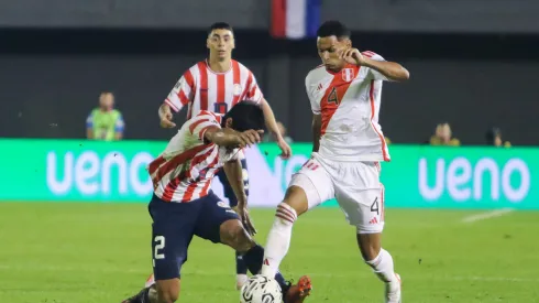 CIUDAD DEL ESTE, PARAGUAY – SEPTEMBER 07: Marcos Lopez of Peru battles for possession with Robert Rojas of Paraguay during a FIFA World Cup 2026 Qualifier match between Paraguay and Peru at Antonio Aranda Stadium on September 07, 2023 in Ciudad del Este, Paraguay. (Photo by Christian Alvarenga/Getty Images)
