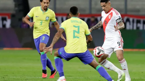 LIMA, PERU – SEPTEMBER 12: Paolo Guerrero of Peru competes for the ball with Danilo of Brazil during a FIFA World Cup 2026 Qualifier match between Peru and Brazil at Estadio Nacional de Lima on September 12, 2023 in Lima, Peru. (Photo by Mariana Bazo/Getty Images)

