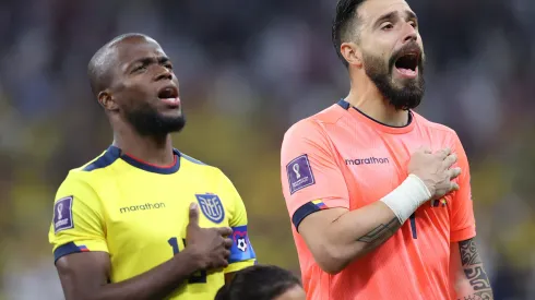 AL KHOR, QATAR – NOVEMBER 20: Angel Mena (l) and Hernan Galindez (r) of Ecuador during the national anthems ahead of   the FIFA World Cup Qatar 2022 Group A match between Qatar and Ecuador at Al Bayt Stadium on November 20, 2022 in Al Khor, Qatar. (Photo by Michael Steele/Getty Images)
