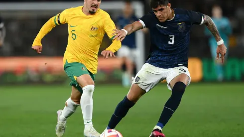 MELBOURNE, AUSTRALIA - MARCH 28: Marco Tilio of the Socceroos and Piero Hincapie of Ecuador compete for the ball during the International Friendly match between the Australia Socceroos and Ecuador at Marvel Stadium on March 28, 2023 in Melbourne, Australia. (Photo by Quinn Rooney/Getty Images)
