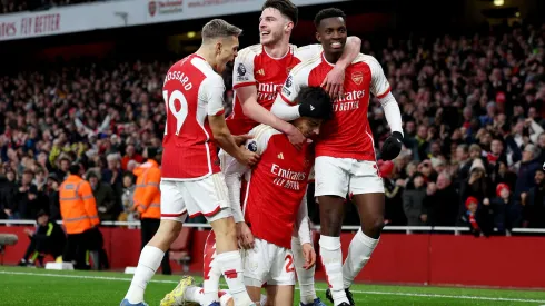 LONDON, ENGLAND - DECEMBER 17: Kai Havertz of Arsenal celebrates with teammates after scoring their team's second goal during the Premier League match between Arsenal FC and Brighton & Hove Albion at Emirates Stadium on December 17, 2023 in London, England. (Photo by Richard Heathcote/Getty Images)