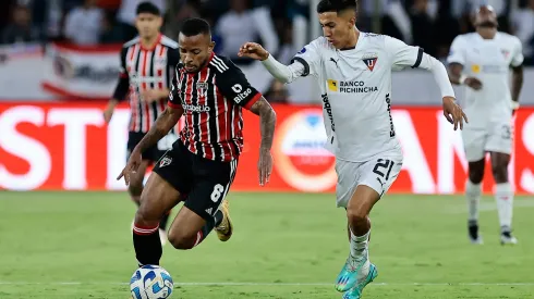 QUITO, ECUADOR – AUGUST 24: Welington of Sao Paulo battles for the ball with Sebastian Gonzalez of LDU Quito during the Copa CONMEBOL Libertadores 2023 Quarterfinal first leg match between LDU Quito and Sao Paulo at Rodrigo Paz Delgado Stadium on August 24, 2023 in Quito, Ecuador. (Photo by Franklin Jacome/Getty Images)
