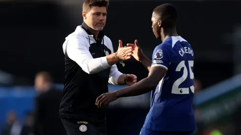 BURNLEY, ENGLAND – OCTOBER 07: Mauricio Pochettino, Manager of Chelsea, interacts with Moises Caicedo of Chelsea following the Premier League match between Burnley FC and Chelsea FC at Turf Moor on October 07, 2023 in Burnley, England. (Photo by George Wood/Getty Images)
