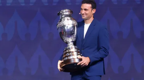 MIAMI, FLORIDA - DECEMBER 07: Lionel Scaloni, Head Coach of Argentina, presents the Copa America trophy during the official draw of CONMEBOL Copa America 2024 at James L. Knight Center on December 07, 2023 in Miami, Florida. (Photo by Eva Marie Uzcategui/Getty Images)