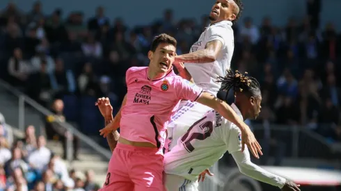 March 11, 2023, MADRID, MADRID, SPAIN: Cesar Montes of Espanyol and Eder Militao and Eduardo Camavinga of Real Madrid fi
