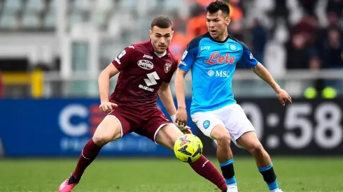 Torino FC v SSC Napoli - Serie A Hirving Lozano of SSC Napoli competes for the ball with Alessandro Buongiorno of Torino