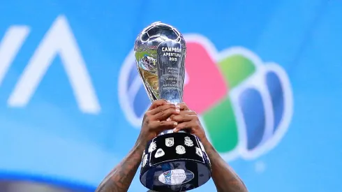 MEXICO CITY, MEXICO – DECEMBER 29: Dorlan Pabon #8 of Monterrey celebrates with the champions trophy after the Final second leg match between America and Monterrey as part of the Torneo Apertura 2019 Liga MX at Azteca Stadium on December 29, 2019 in Mexico City, Mexico. (Photo by Hector Vivas/Getty Images)
