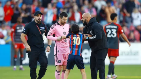 Lionel Messi y su guardaespaldas