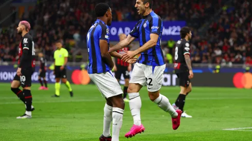 MILAN, ITALY – MAY 10: Henrikh Mkhitaryan of FC Internazionale celebrates after scoring the team's second goal with teammate Denzel Dumfries during the UEFA Champions League semi-final first leg match between AC Milan and FC Internazionale at San Siro on May 10, 2023 in Milan, Italy. (Photo by Clive Rose/Getty Images)
