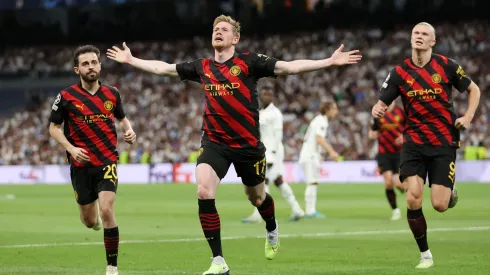 MADRID, SPAIN - MAY 09: Kevin De Bruyne of Manchester City celebrates after scoring the team's first goal during the UEFA Champions League semi-final first leg match between Real Madrid and Manchester City FC at Estadio Santiago Bernabeu on May 09, 2023 in Madrid, Spain. (Photo by Julian Finney/Getty Images)