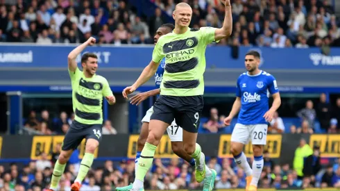 LIVERPOOL, ENGLAND - MAY 14: Erling Haaland celebrates after Ilkay Guendogan of Manchester City (not pictured) scored their sides third goal from a free kick during the Premier League match between Everton FC and Manchester City at Goodison Park on May 14, 2023 in Liverpool, England. (Photo by Michael Regan/Getty Images)