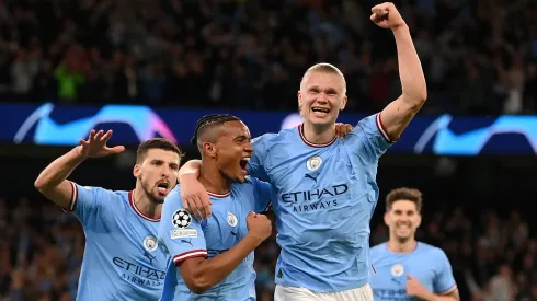 MANCHESTER, ENGLAND – MAY 17: Manuel Akanji celebrates with Erling Haaland of Manchester City after an own goal by Eder Militao of Real Madrid (not pictured) Manchester City's third goal during the UEFA Champions League semi-final second leg match between Manchester City FC and Real Madrid at Etihad Stadium on May 17, 2023 in Manchester, England. (Photo by Michael Regan/Getty Images)

