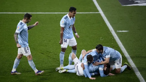 VIGO, SPAIN – JANUARY 24: Brais Mendez of Celta Vigo celebrates with Renato Tapia and team mates after scoring their side's first goal during the La Liga Santander match between RC Celta and SD Eibar at Abanca-Balaídos on January 24, 2021 in Vigo, Spain. Sporting stadiums around Spain remain under strict restrictions due to the Coronavirus Pandemic as Government social distancing laws prohibit fans inside venues resulting in games being played behind closed doors. (Photo by Octavio Passos/Getty Images)
