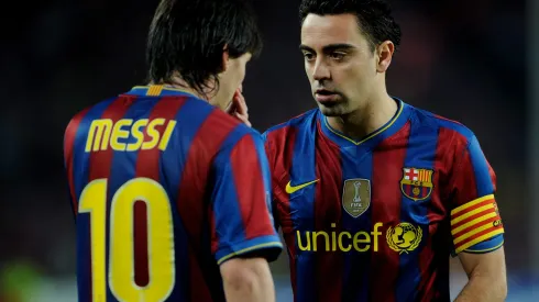 BARCELONA, SPAIN – APRIL 28: Xavi of Barcelona talks to team mate Lionel Messi during the UEFA Champions League Semi Final Second Leg match between Barcelona and Inter Milan at Camp Nou on April 28, 2010 in Barcelona, Spain.  (Photo by Michael Regan/Getty Images)
