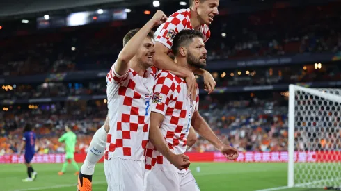 ROTTERDAM, NETHERLANDS – JUNE 14: Bruno Petkovic of Croatia celebrates with teammates after scoring the team's third goal during the UEFA Nations League 2022/23 semifinal match between Netherlands and Croatia at De Kuip on June 14, 2023 in Rotterdam, Netherlands. (Photo by Christof Koepsel/Getty Images)
