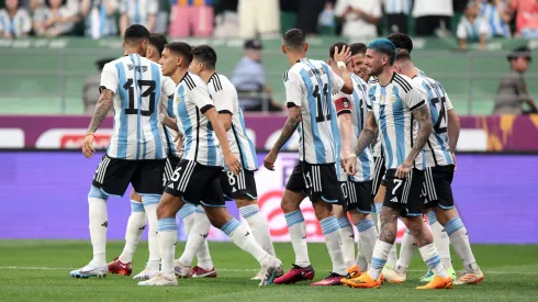 BEIJING, CHINA – JUNE 15: Argentina players celebrate the team's first goal scored by Lionel Messi (obscured) during the international friendly match between Argentina and Australia at Workers Stadium on June 15, 2023 in Beijing, China. (Photo by Lintao Zhang/Getty Images)