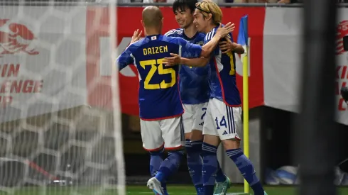 SUITA, JAPAN – JUNE 20: Junya Ito (R) of Japan celebrates with teammates Kaoru Mitoma (C) and Daizen Maeda (L) after scoring the team's third goal during the international friendly match between Japan and Peru at Panasonic Stadium Suita on June 20, 2023 in Suita, Osaka, Japan. (Photo by Kenta Harada/Getty Images)
