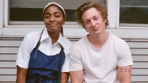 Ayo Edebiri and Jeremy Allen White in the set of The Bear.
