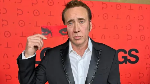 Nicolas Cage with his ticket to the premiere.
