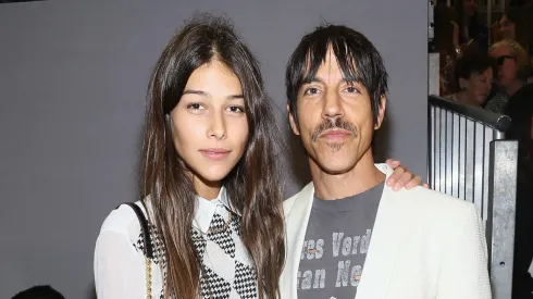 Anthony Kiedis and Helena Vestergaard  attend the Tommy Hilfiger Women's fashion show during Mercedes-Benz Fashion Week Spring 2014 at Pier 94 on September 9, 2013 in New York City.
