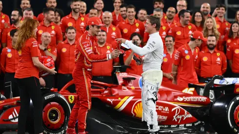  Brad Pitt, star of the upcoming Formula One based movie, F1, talks with Charles Leclerc of Monaco and Ferrari at the Ferrari team photo during previews ahead of the F1 Grand Prix of Abu Dhabi at Yas Marina Circuit on December 05, 2024 in Abu Dhabi, United Arab Emirates. (Photo by Clive Mason/Getty Images)
