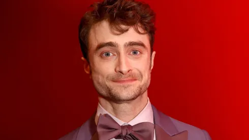 Daniel Radcliffe poses with the Best Performance by an Actor in a Featured Role in a Musical award for "Merrily We Roll Along"
