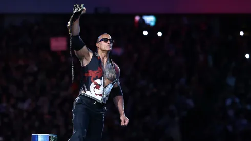 Dwayne "The Rock" Johnson is introduced during a tag team match with Roman Reigns against Cody Rhodes and Seth "Freakin" Rollins during Night One of WrestleMania 40 at Lincoln Financial Field on April 06, 2024 in Philadelphia, Pennsylvania. (Photo by Tim Nwachukwu/Getty Images)
