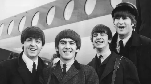 392279 03: FILE PHOTO: The Beatles, left to right, Paul McCartney, George Harrison, Ringo Starr and John Lennon (1940 – 1980) arrive at London Airport February 6, 1964, after a trip to Paris. Conflicting reports were released July 23, 2001 regarding Beatle George Harrison"s battle with cancer. Music producer Sir George Martin was quoted as saying that Harrison expects to die soon from his illnesses. The 58-year-old musician underwent treatment for a brain tumor at a clinic in Switzerland, and had surgery earlier this year for lung cancer. (Photo by Getty Images)
