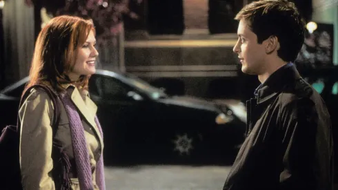 Tobey Maguire and Kirsten Dunst looking at one an other in a scene from the film 'Spiderman', 2002. (Photo by Columbia Pictures/Getty Images)
