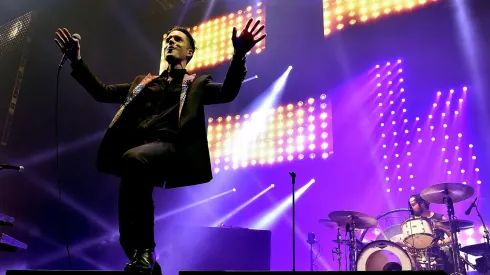 LAS VEGAS, NEVADA – APRIL 06:  Musicians Brandon Flowers (L) and Ronnie Vannucci, Jr. of The Killers perform onstage during the grand opening of T-Mobile Arena on April 6, 2016 in Las Vegas, Nevada.  (Photo by Kevin Winter/Getty Images for ABA)
