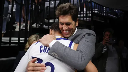 Stephen Curry y Bob Myers
